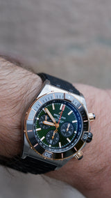 Breitling Chronomat Zielony 44mm Zloto/Stal UB0136251L1S1